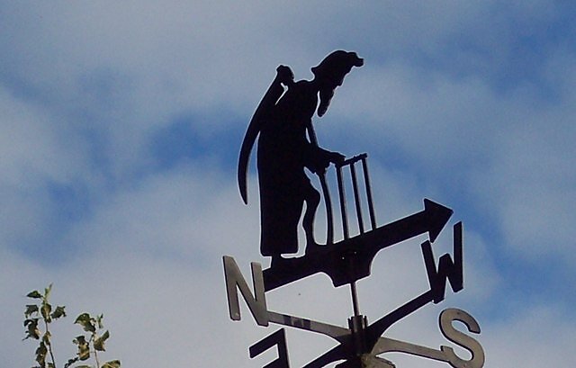 The Grim Reaper on a cottage in Netton Street - Trish Steel